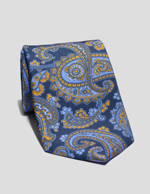 Made-in-UK Navy Printed Paisley Tie sold by J. Press