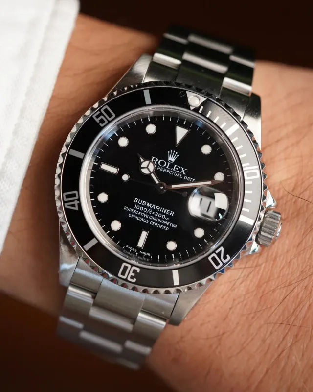 Rolex Submariner Ref. 16610 Full Set sold by J. Press