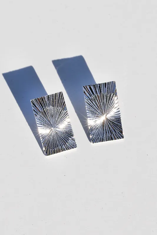 SUNRAY EARRINGS- SILVER PLATE sold by Native Gem