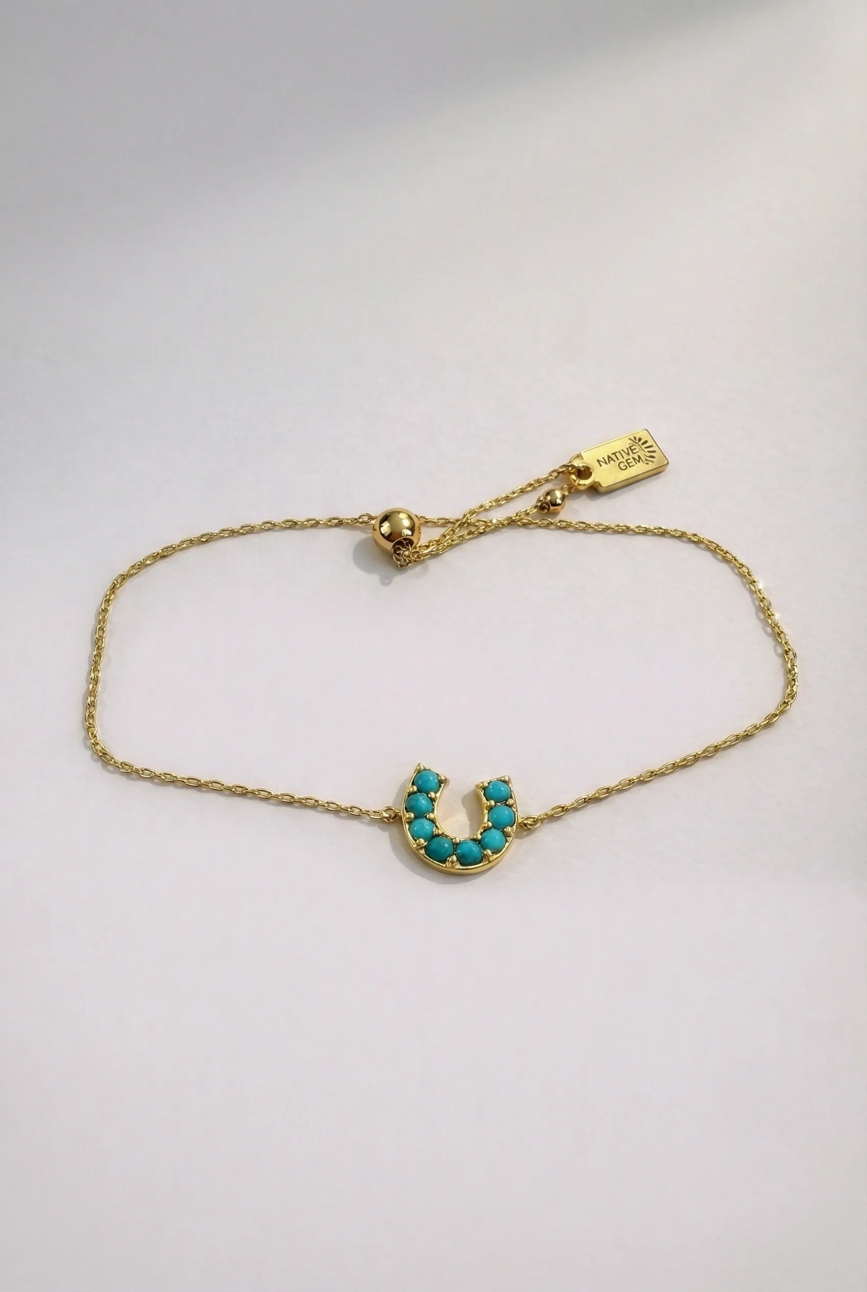 LUCKY HORSESHOE BRACELET- GOLD + TURQUOISE sold by Native Gem