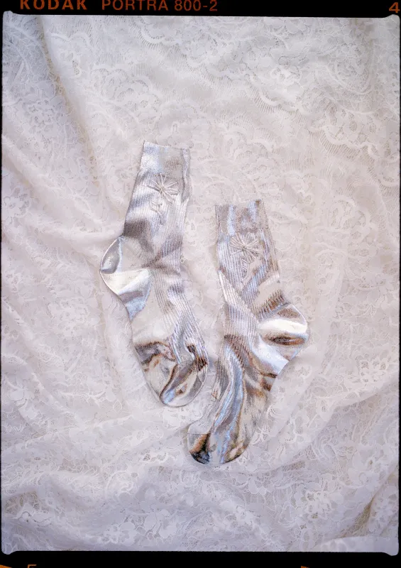 Laminated Dandelion Socks sold by Pura Utz ApS