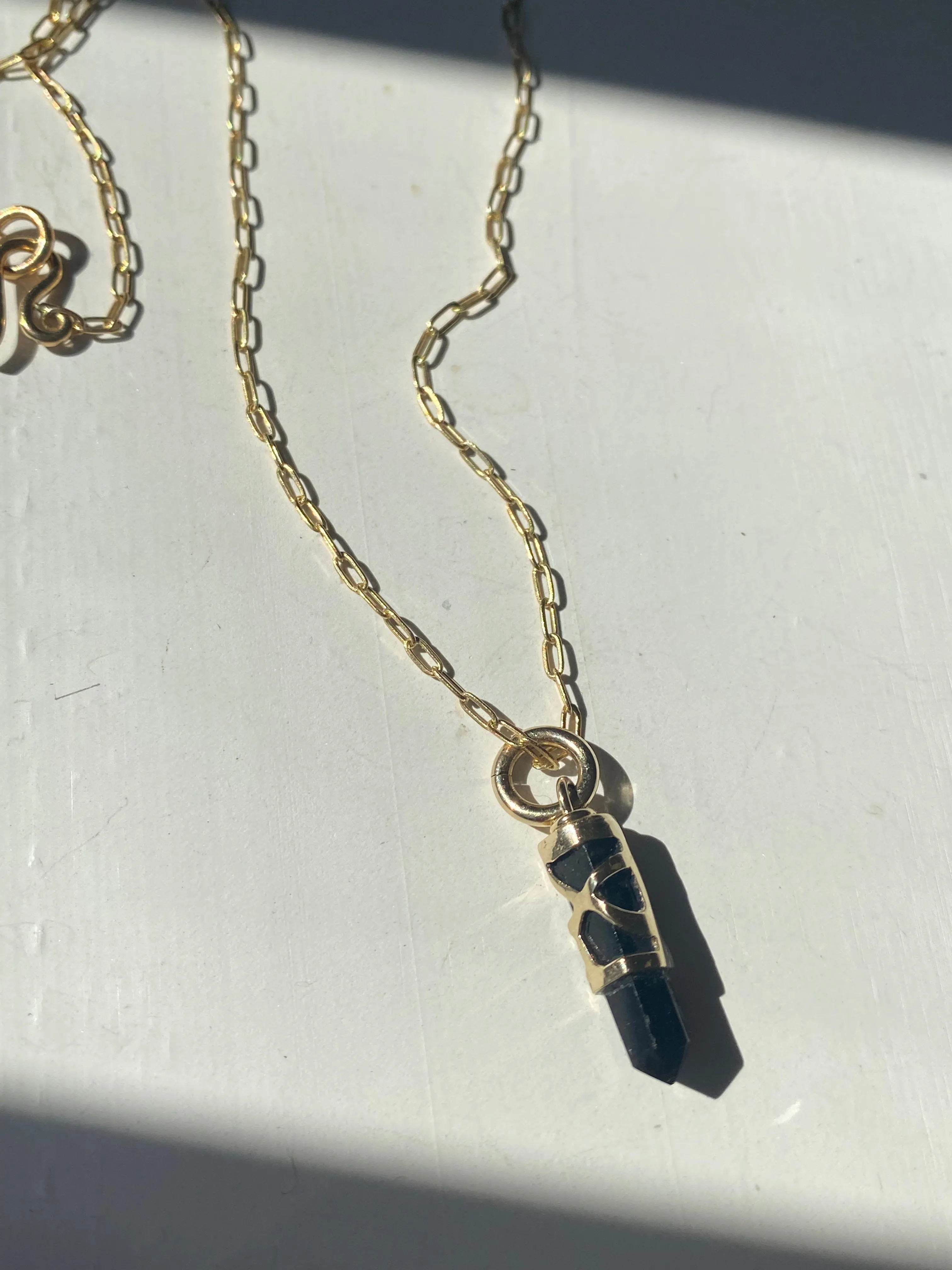 La ventana quartz necklace sold by Lissa Bowie