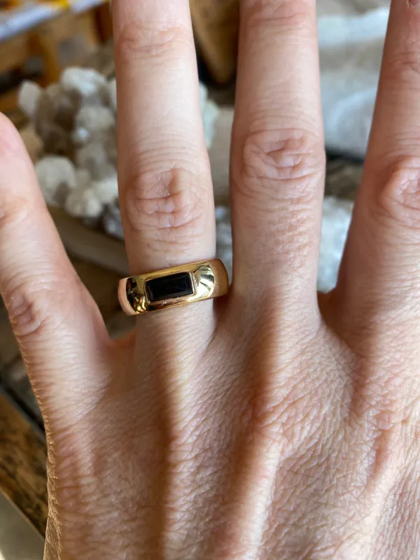Onyx baguette half round ring sold by Lissa Bowie