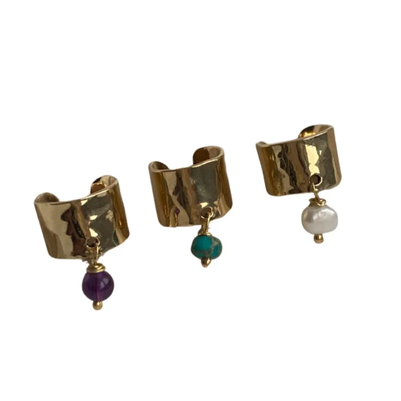 Charm earcuff sold by Lissa Bowie