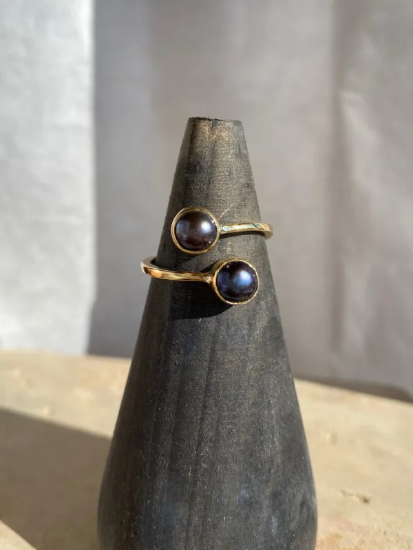 Wrap around pearl ring sold by Lissa Bowie