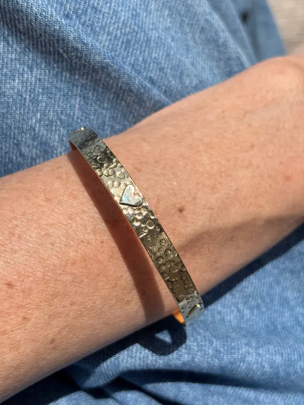 The five Hearts bangle sold by Lissa Bowie