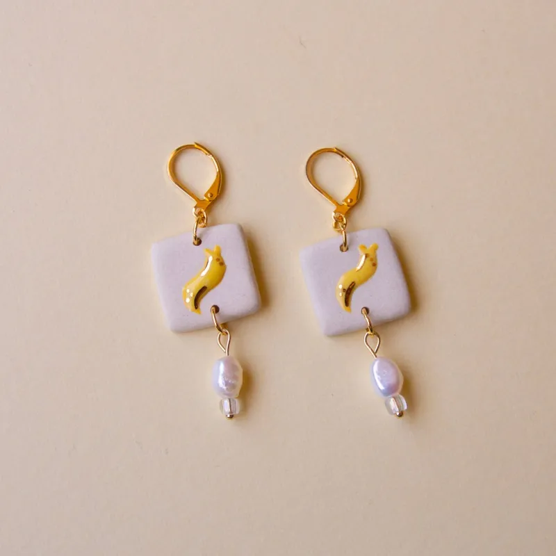Tile Earrings - Banana Slug sold by Meghan MacWhirter
