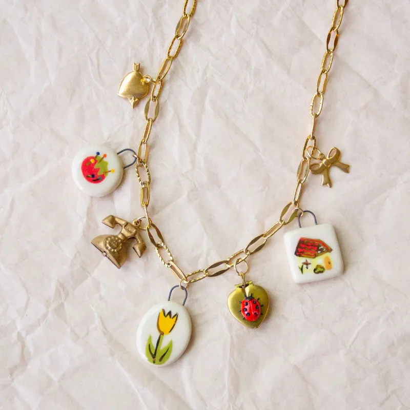 Socks Charm Necklace sold by Meghan MacWhirter