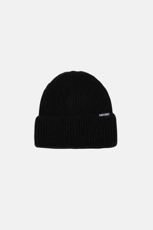 ONYX RIB KNIT BEANIE sold by Black & Liberty