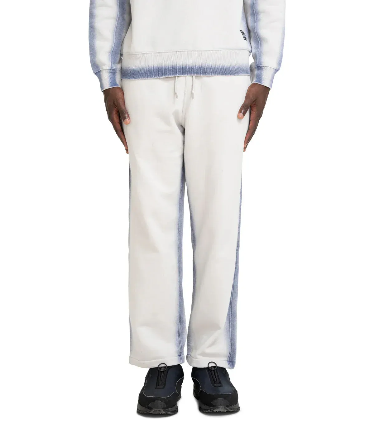 The Trilogy Tapes Overdye Open Hem Jogger Grey Blue sold by Somewhere