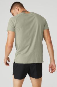 The Triumph Crew Neck Tee - Limestone sold by Alo Yoga