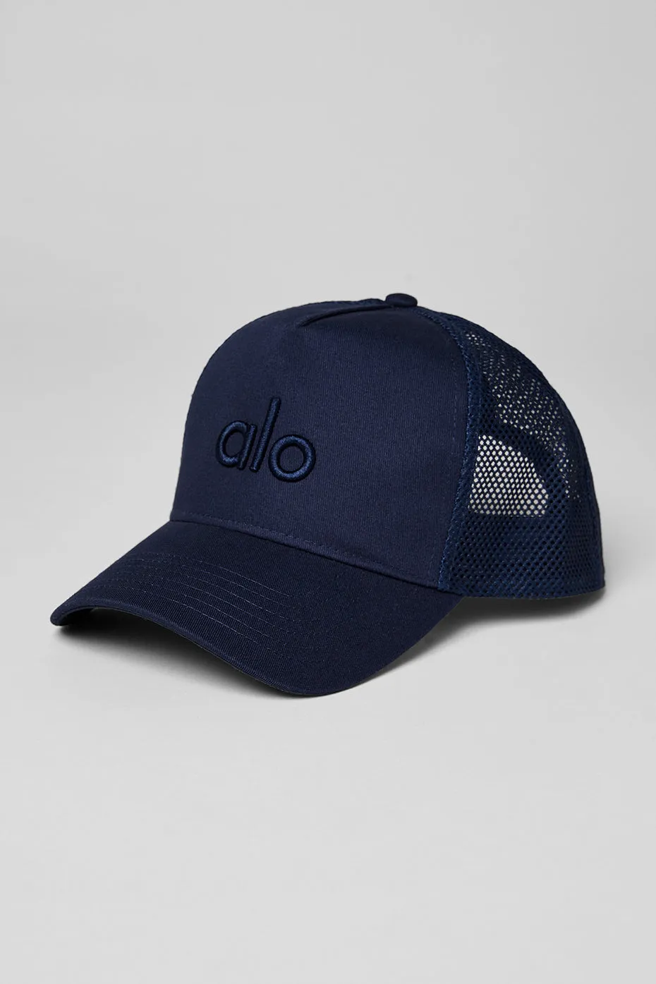 District Trucker Hat - Navy sold by Alo Yoga