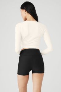 Cropped Escalate Wrap Top - Ivory sold by Alo Yoga