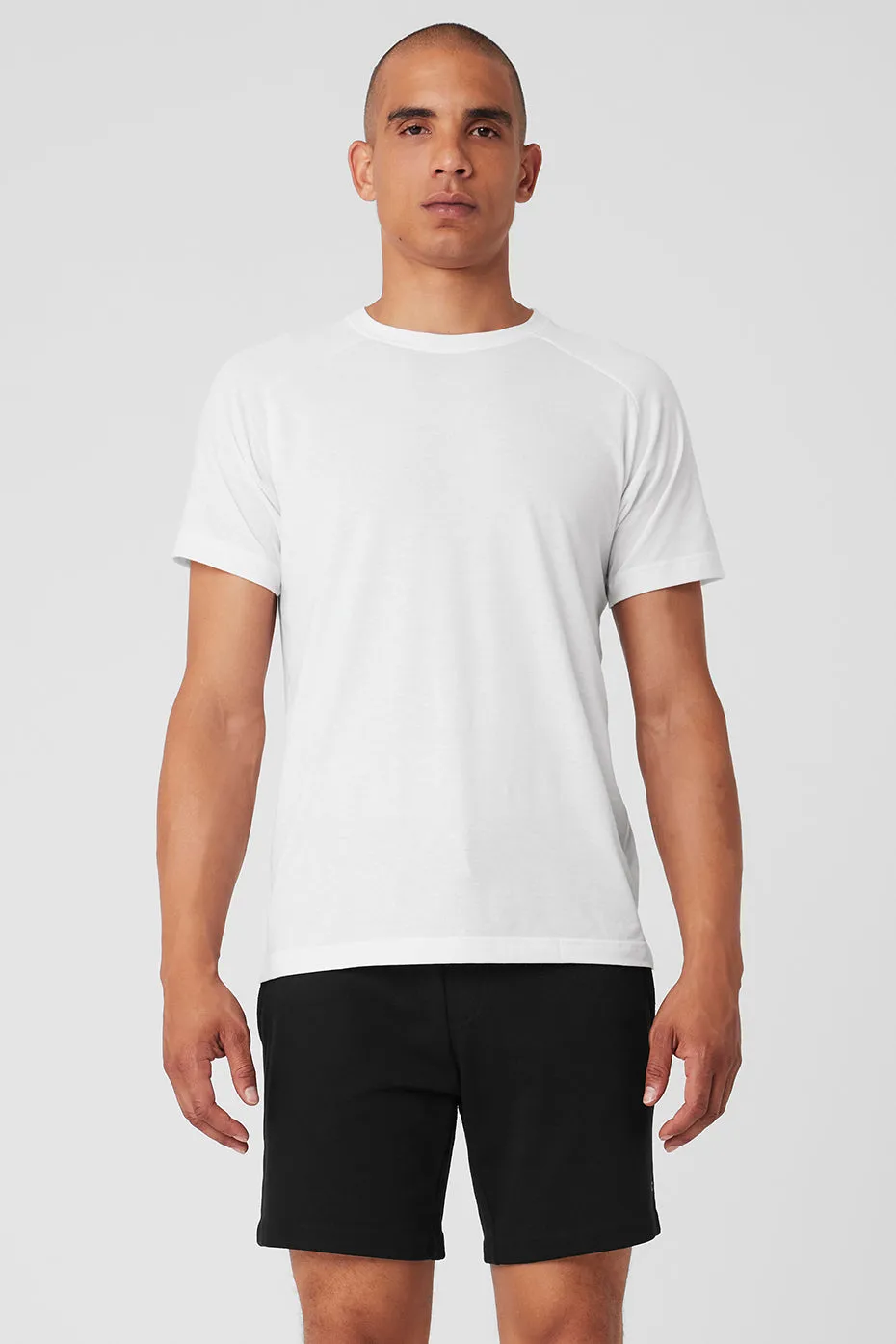 Triumph Raglan Tee - White sold by Alo Yoga