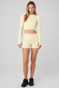 Seamless Cable Knit Long Sleeve Top & Semi-Sheer Seamless Cable Knit Hot Short Set sold by Alo Yoga