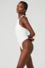 Goddess Rib Prime Time Halter Bodysuit - White sold by Alo Yoga