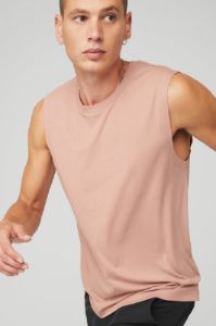 The Triumph Muscle Tank - Soft Clay sold by Alo Yoga