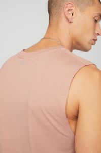 The Triumph Muscle Tank - Soft Clay sold by Alo Yoga