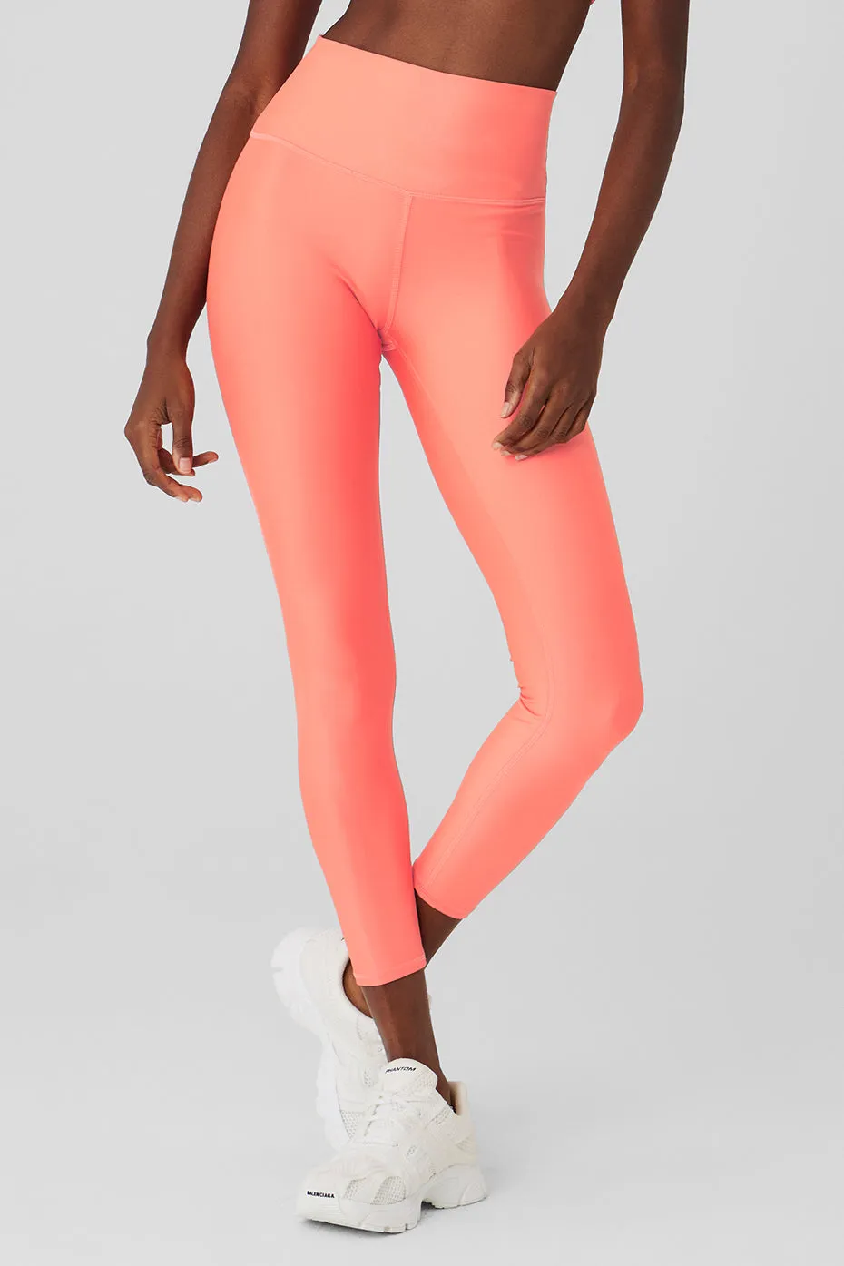 7/8 High-Waist Airlift Legging - Candy Orange sold by Alo Yoga