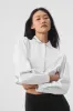 Cropped Take Me Out Button Up - White sold by Alo Yoga