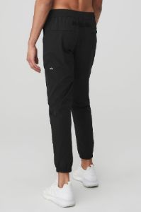 Talus Tech Pant - Black sold by Alo Yoga