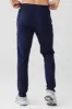 Conquer Pulse Pant - Navy sold by Alo Yoga
