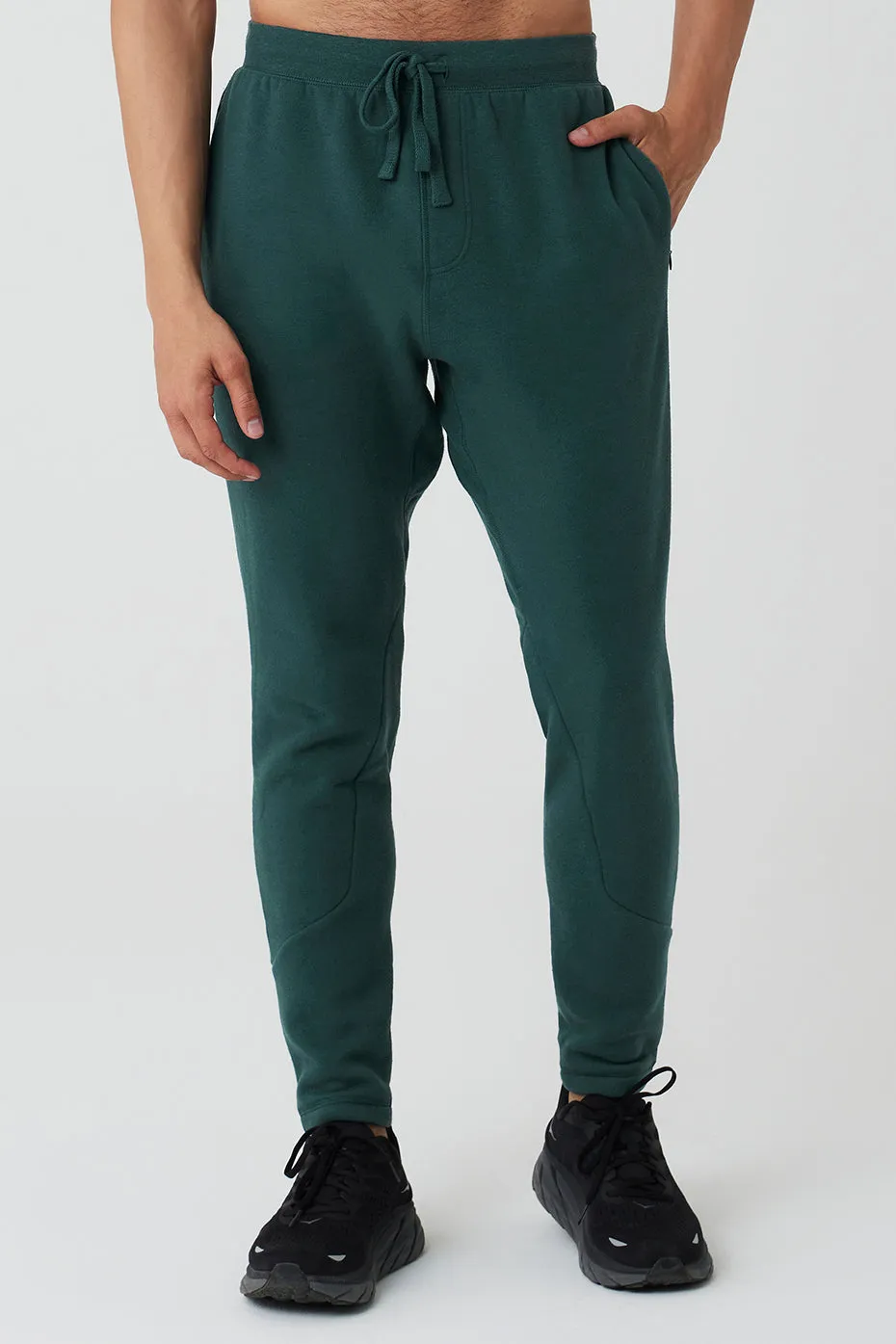 The Triumph Sweatpant - Midnight Green sold by Alo Yoga