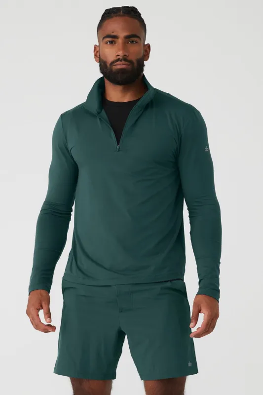 Conquer 1/4 Zip Reform Long Sleeve - Midnight Green sold by Alo Yoga