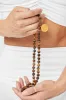 Tiger’s Eye Mala Necklace sold by Alo Yoga