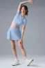 Alosoft Backspin Skirt - Seashell Blue sold by Alo Yoga