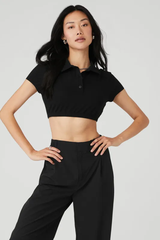 Cropped Prestige Polo - Black sold by Alo Yoga