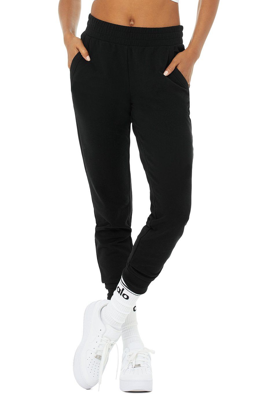 Unwind Sweatpant - Black sold by Alo Yoga