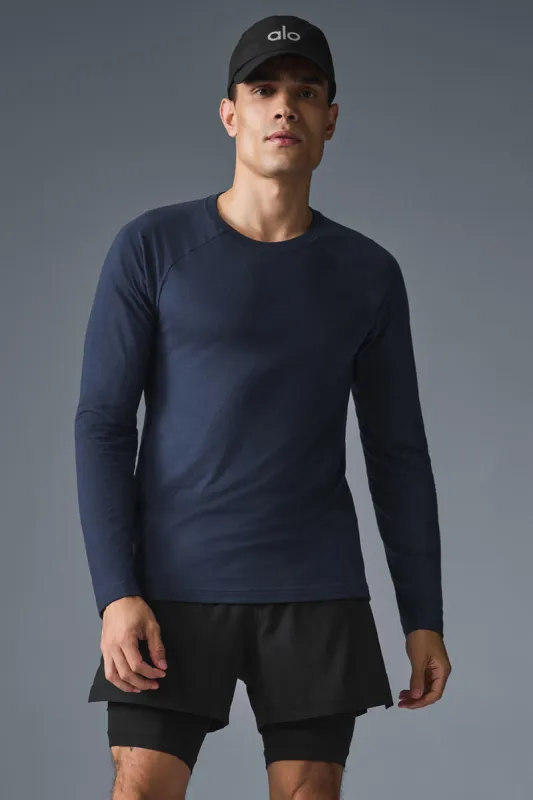 Triumph Long Sleeve Tee - Navy sold by Alo Yoga