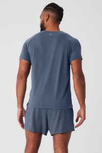 The Triumph Crew Neck Tee - Bluestone sold by Alo Yoga