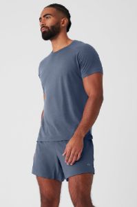 The Triumph Crew Neck Tee - Bluestone sold by Alo Yoga