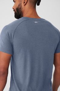 The Triumph Crew Neck Tee - Bluestone sold by Alo Yoga