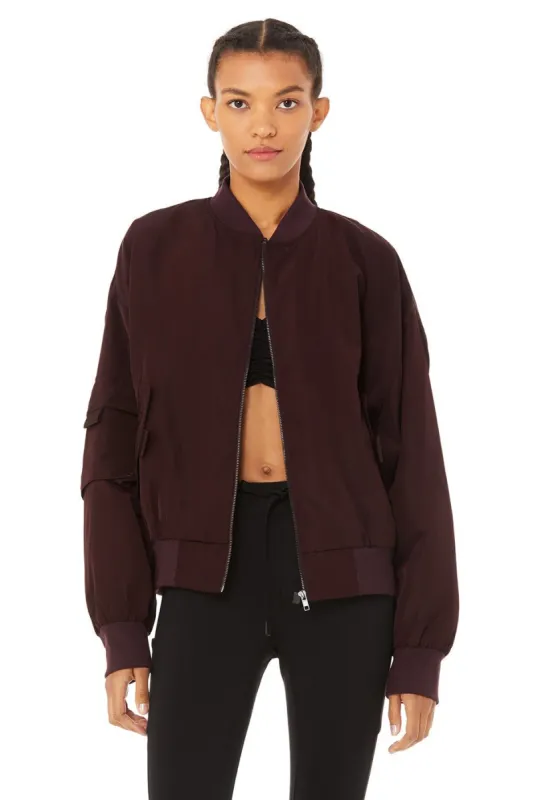 It Girl Bomber - Oxblood sold by Alo Yoga