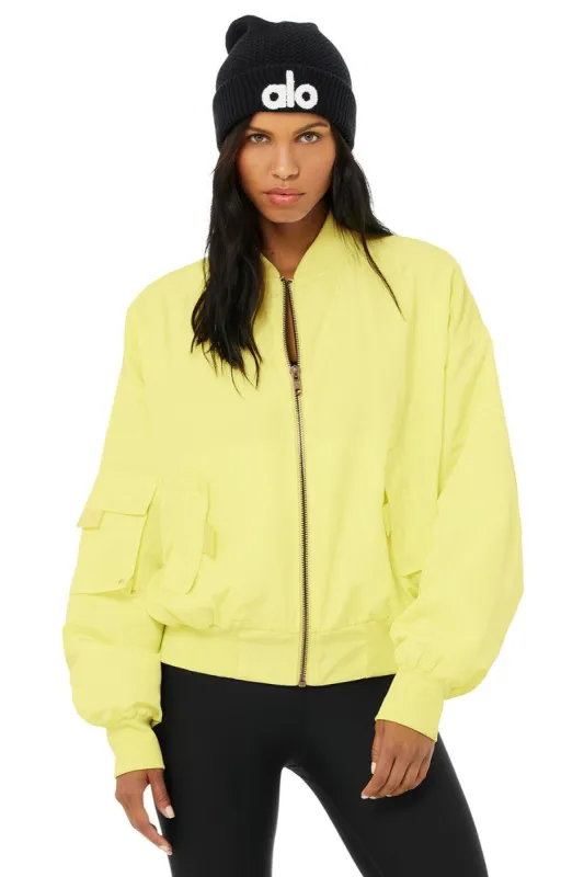 It Girl Bomber - Neon Shock Yellow sold by Alo Yoga