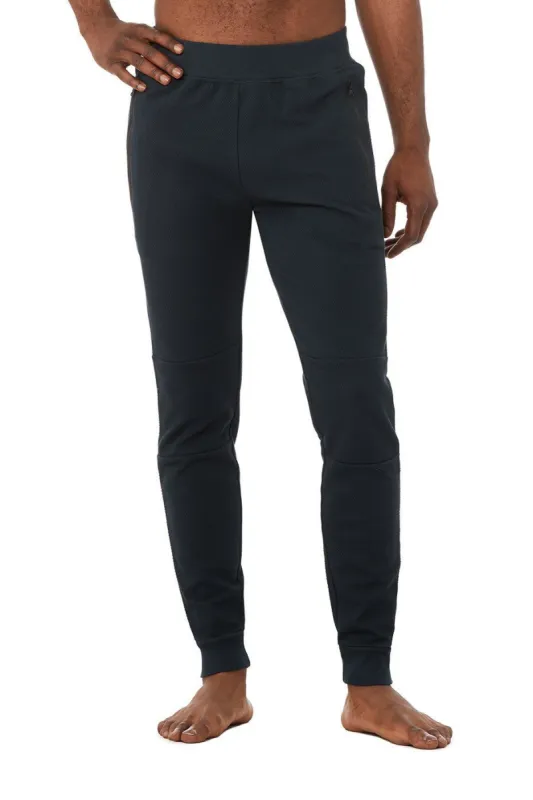 Impel Sweatpant - Dark Navy sold by Alo Yoga