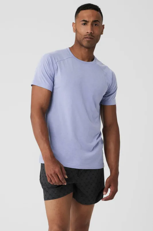 The Triumph Crew Neck Tee - Icy Purple sold by Alo Yoga