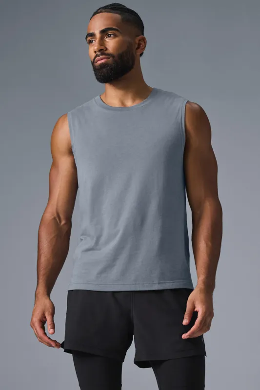 The Triumph Muscle Tank - Steel Grey sold by Alo Yoga