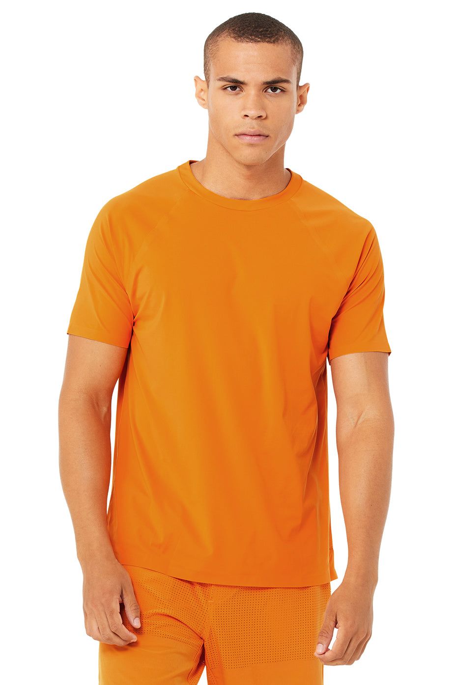 Idol Performance Tee - Atomic Orange sold by Alo Yoga