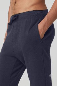 The Triumph Sweatpant - True Navy sold by Alo Yoga