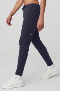 The Triumph Sweatpant - True Navy sold by Alo Yoga