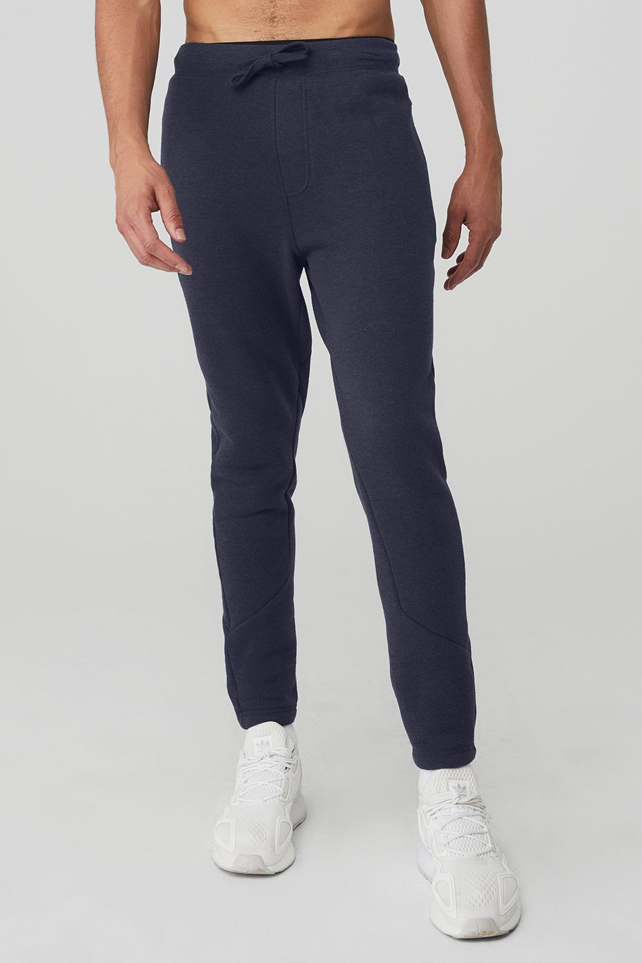 The Triumph Sweatpant - True Navy sold by Alo Yoga