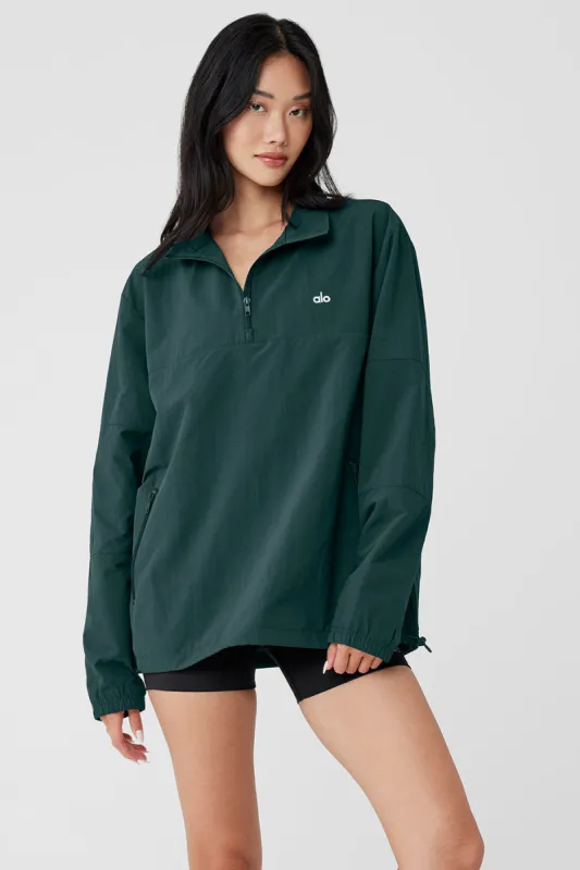 Takeaway Track Pullover - Midnight Green made by Alo Yoga