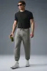 Triumph Restore Sweatpant - Grey Triblend sold by Alo Yoga
