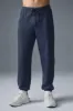 Triumph Restore Sweatpant - Navy sold by Alo Yoga