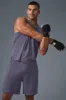 The Triumph Muscle Tank - Italian Plum sold by Alo Yoga