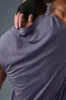 The Triumph Muscle Tank - Italian Plum sold by Alo Yoga